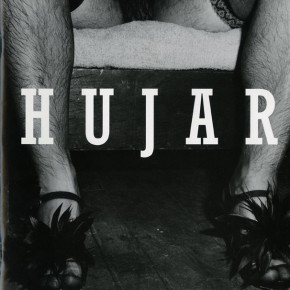 book cover of "Peter Hujar: Intimate Survey" with man's legs spread wearing heels and lingerie