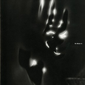 book cover of "Joseph Jachna: Or Water Is - A Photographic Meditation" with dark, abstract shapes