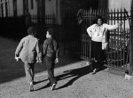 Thumbnail image: A Woman and Two Boys Passing, Harlem, 1978