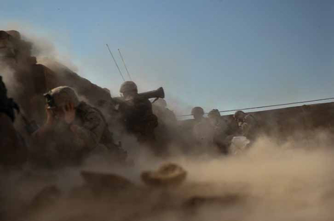 Ashley Gilbertson<br>Marines form Bravo Company, 1st Battalion, 8th Marine Regiment fire a rocket at a home they suspected insurgents were hiding in, deep within the neighborhood nicknamed “Queens” during the battle for Falluja, Iraq on November 13, 2004