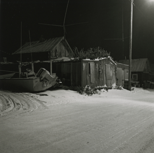 Dennis Witmer <br> Boat and House, Front Street Kotzebue, December 1989