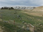Thumbnail image: David T. Hanson <br> View from Sarpy Creek Road: new mine area and spoil piles, Colstrip, Montana, 1985