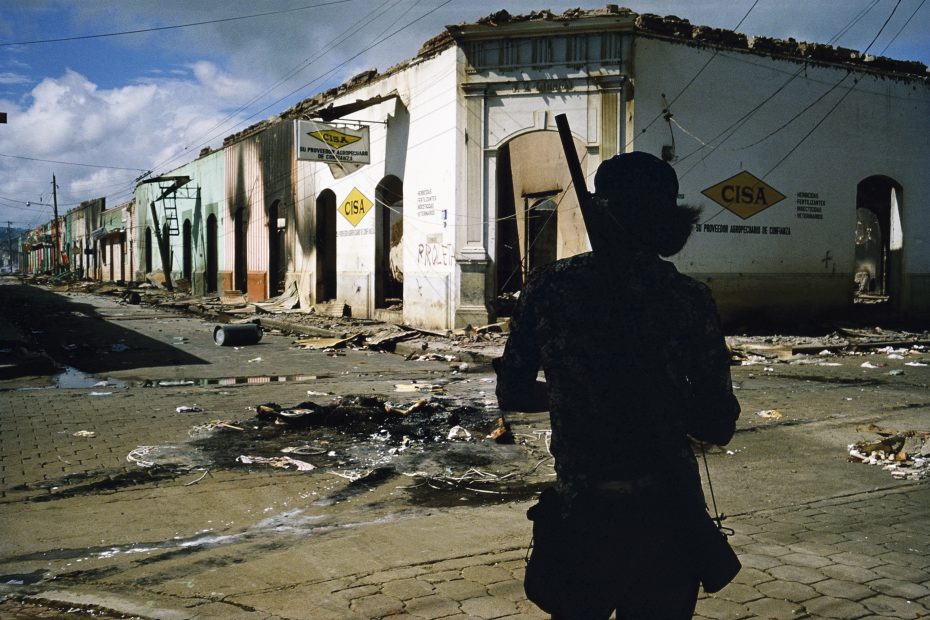 Muchacho withdrawing from commercial district of Masaya after three days of bombing, 1978