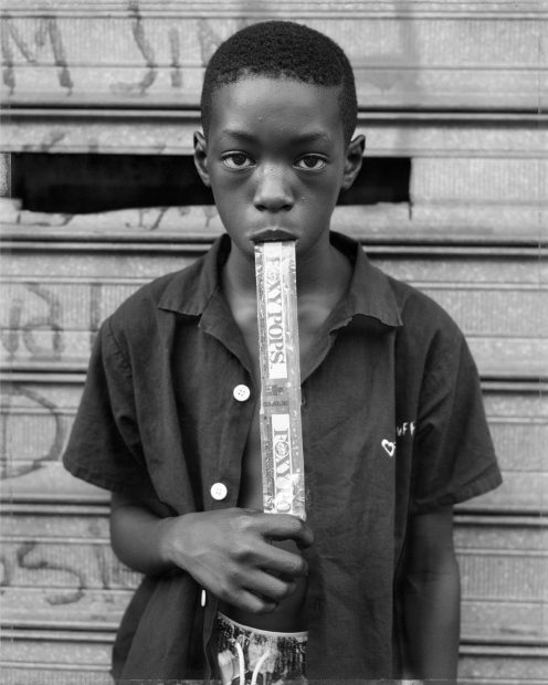 A Boy Eating a Foxy Pop, Brooklyn, NY, 1988