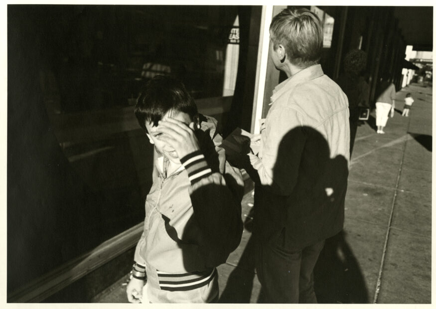 A Boy Shielding His Eyes, Syracuse, NY, 1985