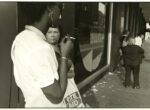 Thumbnail image: A Woman with a Cigarette at the Bus Stop, Syracuse, NY, 1985
