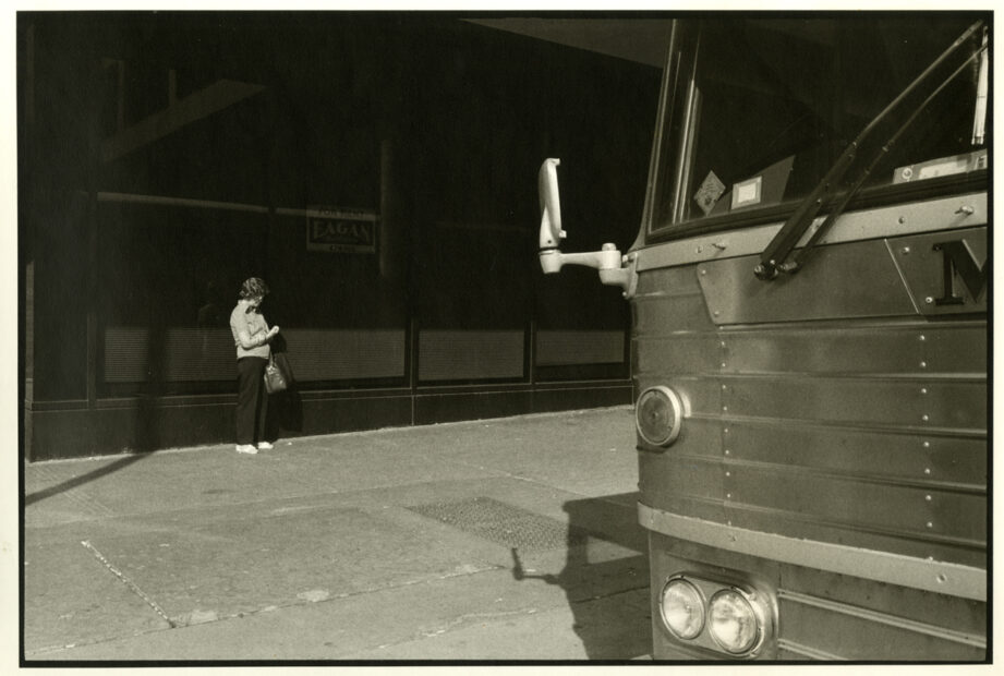 A Woman Alone at the Bus Stop, Syracuse, NY, 1985