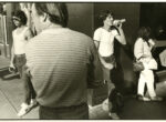 Thumbnail image: Three Men and a Woman, Syracuse, NY, 1985