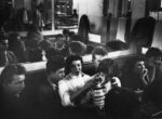 Thumbnail image: van der Elsken, Untitled (Dinner Scene, Young People Lighting Cigarettes), c.1950s