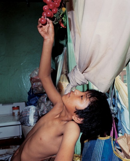 Boy Reaching for Plastic Grapes, 1991
