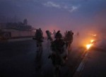 Thumbnail image: Ashley Gilbertson<br>Marines run for cover after white phosphorus was accidentally fired at them by another company when Bravo Company, 1st Battalion, 8th marine Regiment, was somehow mistaken for a band of insurgents in Falluja, Iraq on November 9, 2004