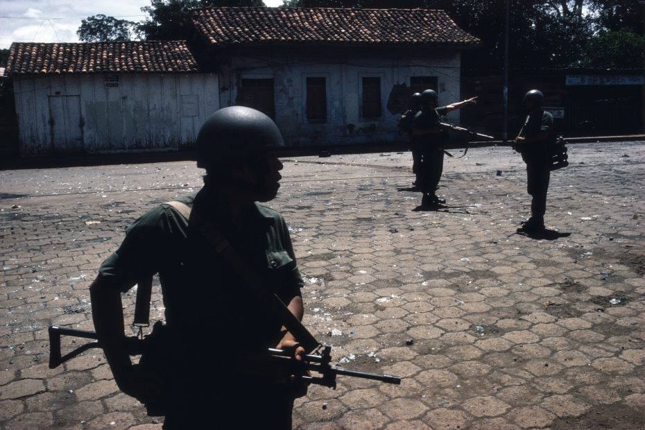 Guard patrol beginning house to house search for Sandinistas, Masaya, 1979