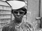 Thumbnail image: A Woman at Fulton Street and Washington Ave, 1989