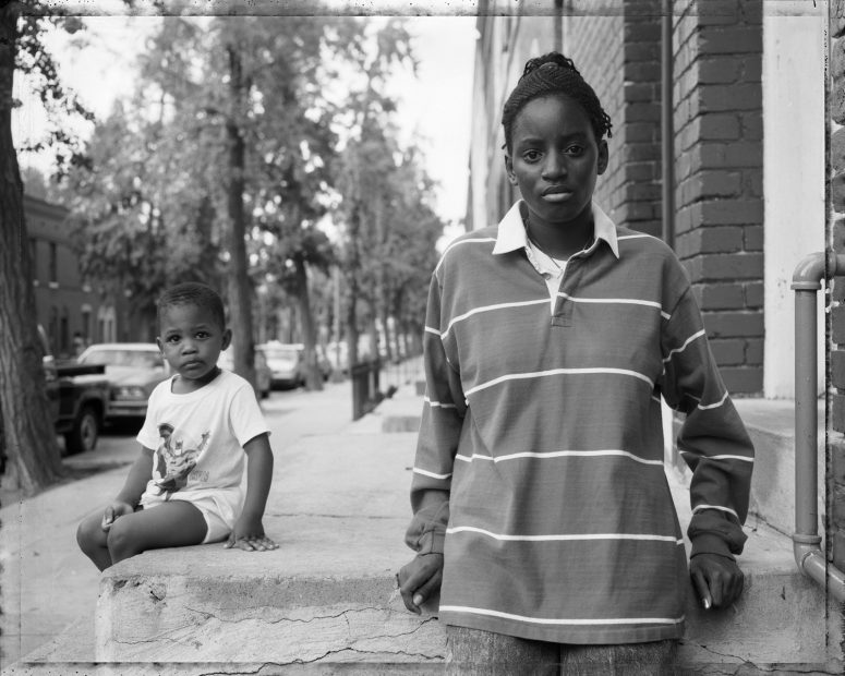 A Girl and Boy Sitting on a Stoop, 1989
